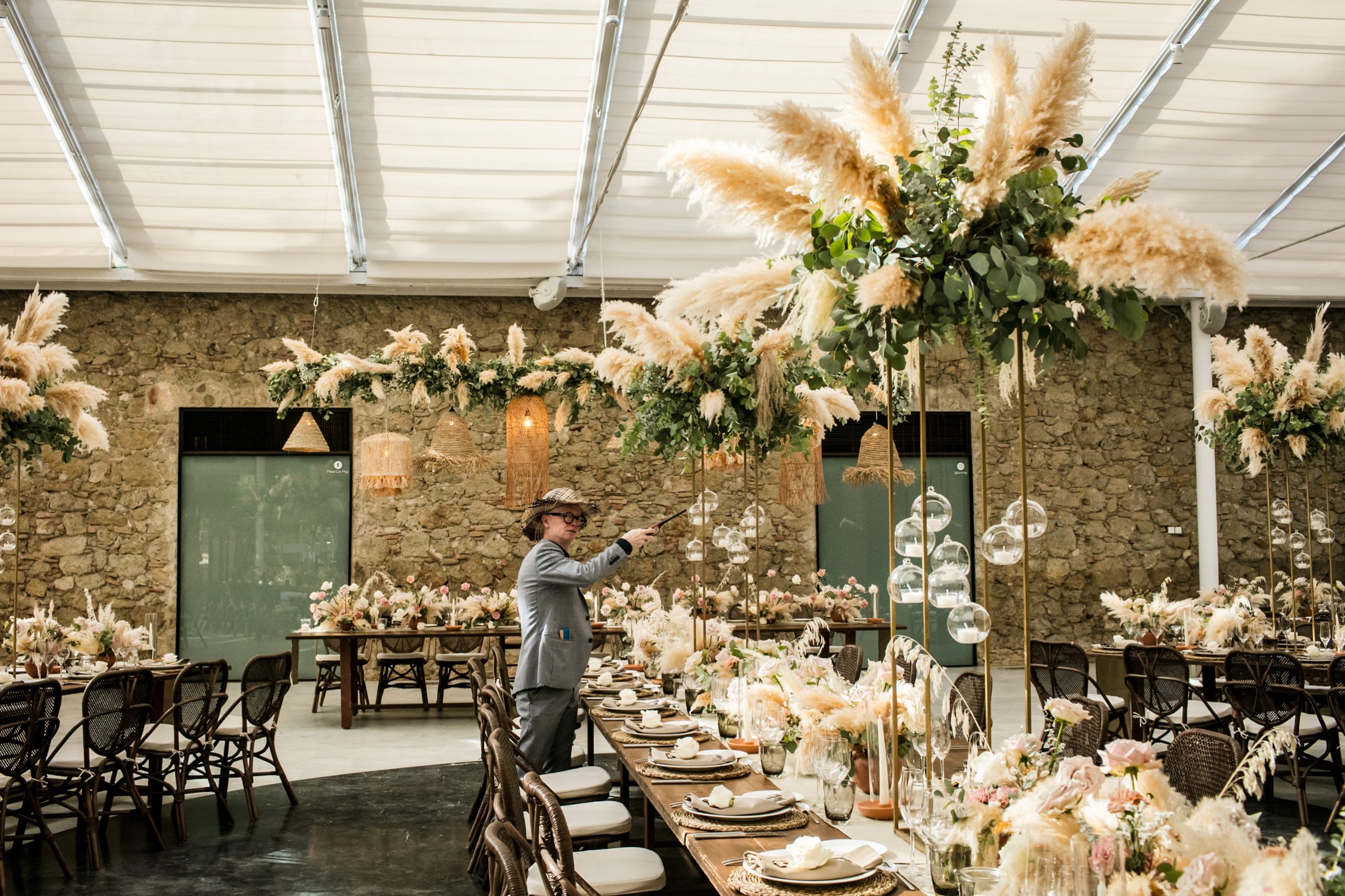 Pampas grass and eucalyptus arranged for an outdoor aperitivo setting